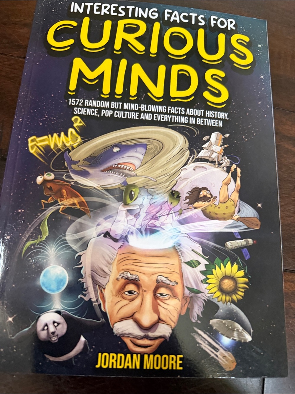 Curious Minds: Interesting Facts Book by Jordan Moore - Black & Yellow Cover